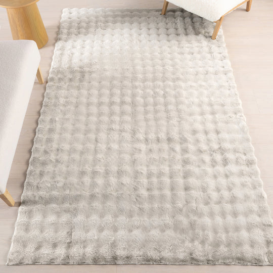 Jeni Solid Plush Machine Washable Area Rug