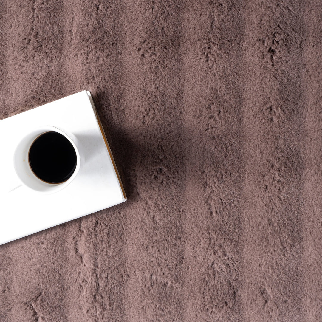 Jeni Solid Plush Machine Washable Area Rug