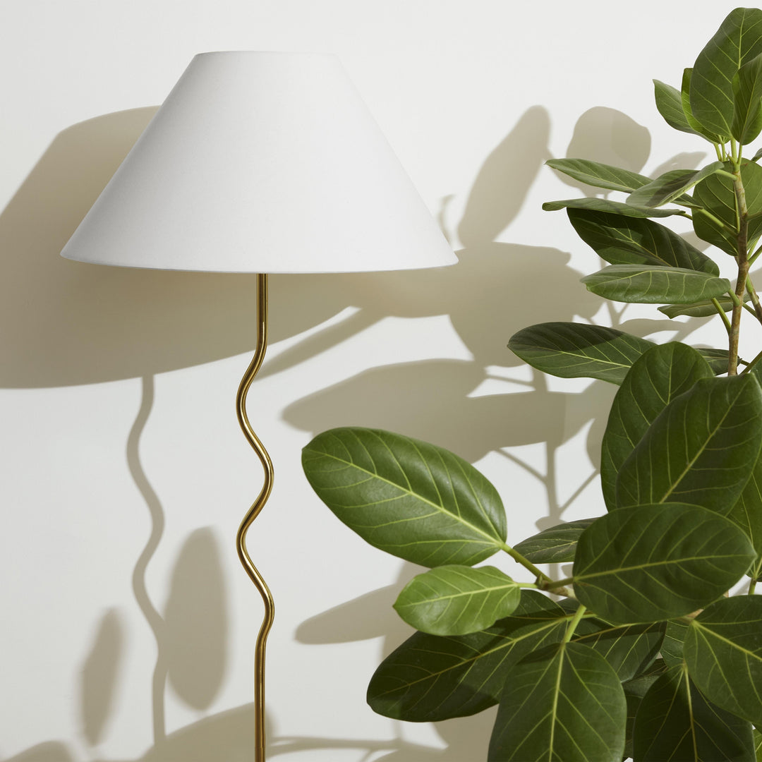 Squiggle Floor 62.13 In. Antiqued Brass Contemporary Ambient Standing Column Floor Lamp with Ivory Fabric Empire Shade