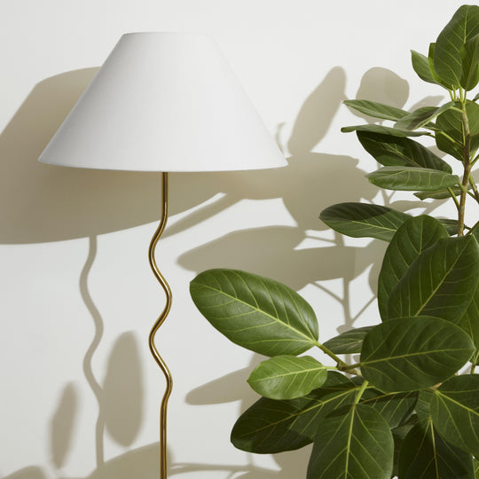 Squiggle Floor 62.13 In. Antiqued Brass Contemporary Ambient Standing Column Floor Lamp with Ivory Fabric Empire Shade