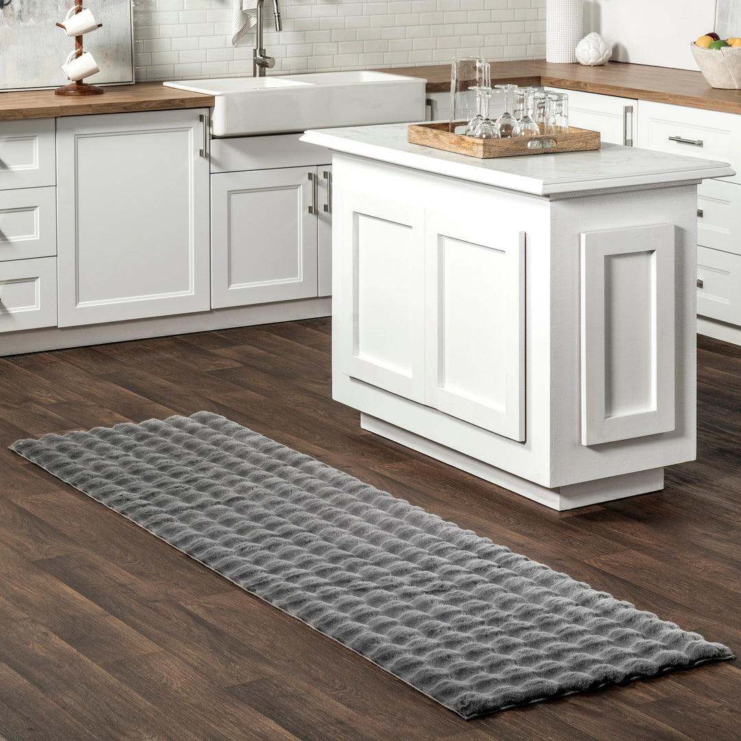 Jeni Solid Plush Machine Washable Area Rug