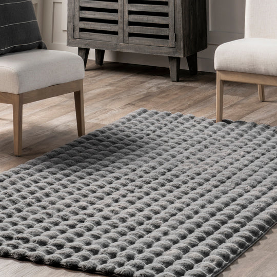 Jeni Solid Plush Machine Washable Area Rug